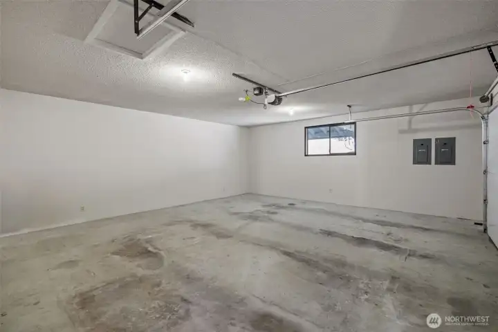Large 2 car Garage with space for your Toys and Tools