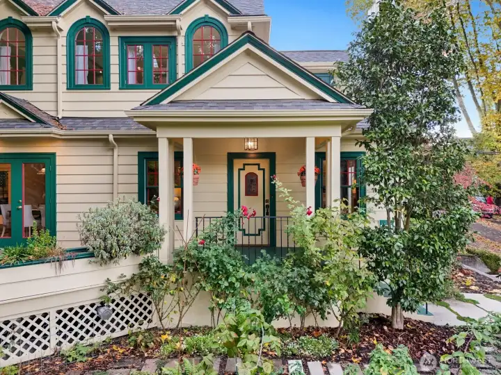 Architectural balance meets natural serenity in this beautifully maintained Leschi home—an inviting blend of history and craftsmanship.  The covered front porch provides protection from the elements as your guests wait to be welcomed in.