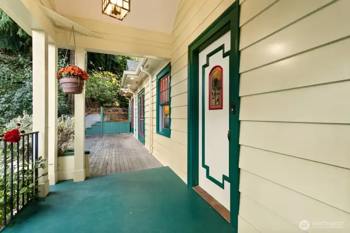 Your covered porch flows onto the entertainment sized deck with additional access through the dining room and kitchen french doors.