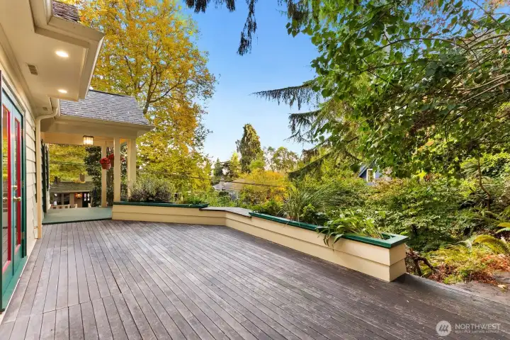 Deck side planter boxes filled with herbs and flowers present a fragrant oasis as you entertain or just enjoy the sounds of nature and enjoy a peaceful retreat after a long day of work.