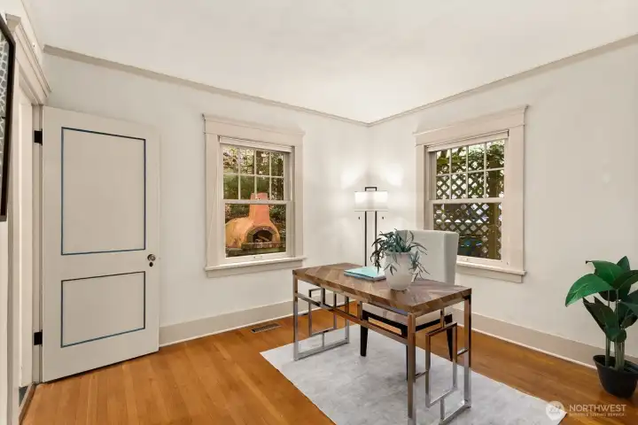 Work from home with views of the garden and the outdoor clay oven just beyond—an ideal balance of productivity and connection to nature.