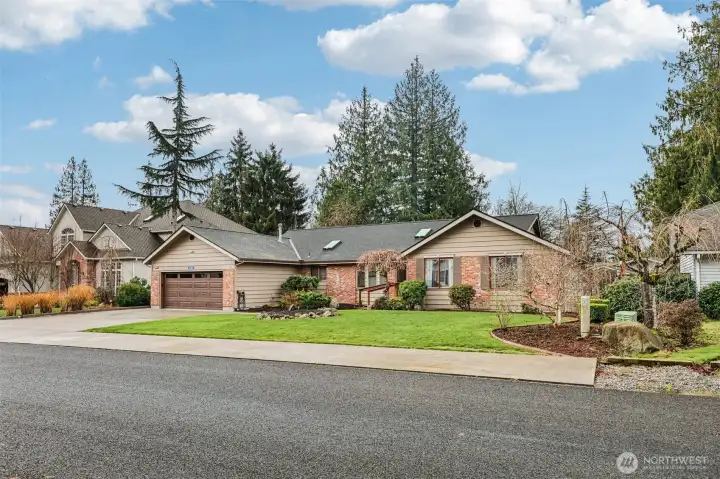 Great one-story home with plenty of parking space and beautiful curve appeal.