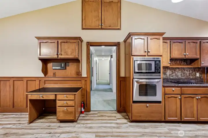 View from the kitchen to the opposie side of the home, toward the bedrooms. Built-in desk!