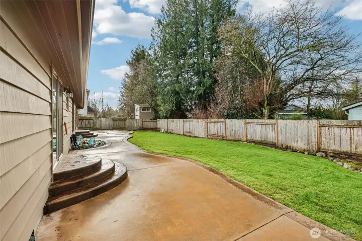 Private, fully fenced backyard.