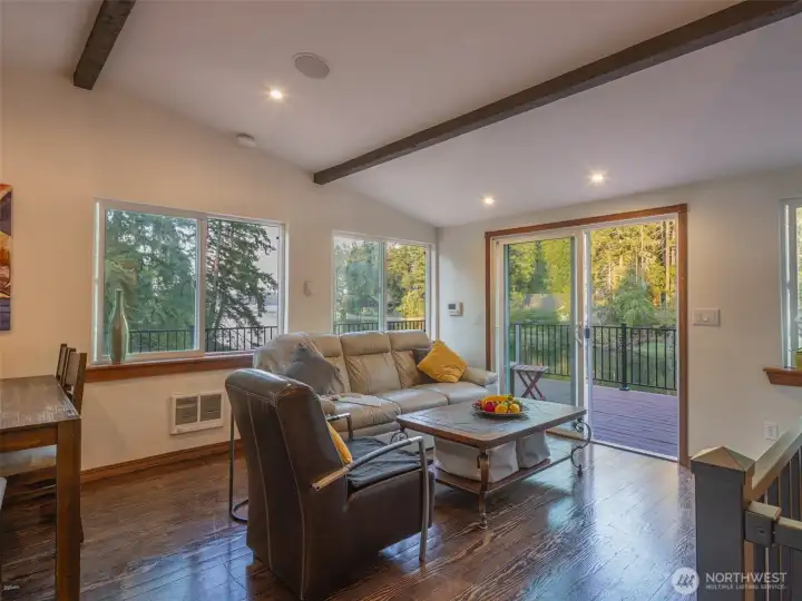 Step outside from the living room to a large deck maximizing your views and entertainment space.