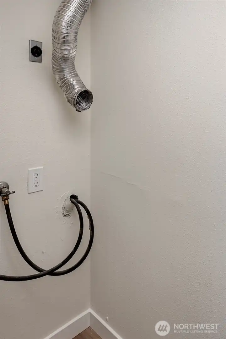 Washer and dryer hook-ups are ready for your stacked unit.