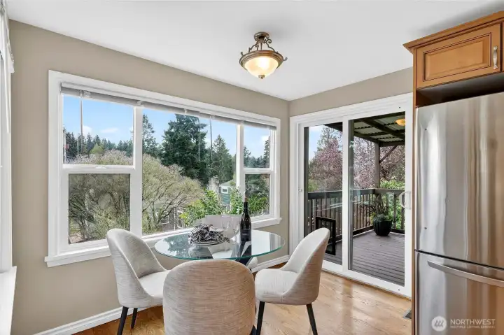 The kitchen opens onto a covered deck, creating a seamless indoor-outdoor living space!