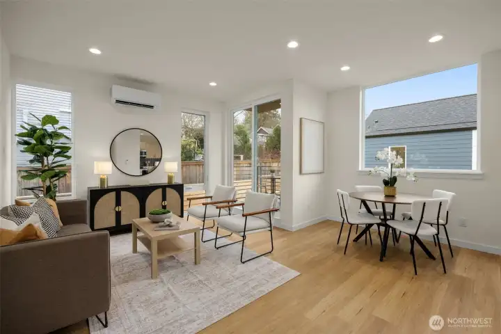 Kitchen opens to living and dining areas.