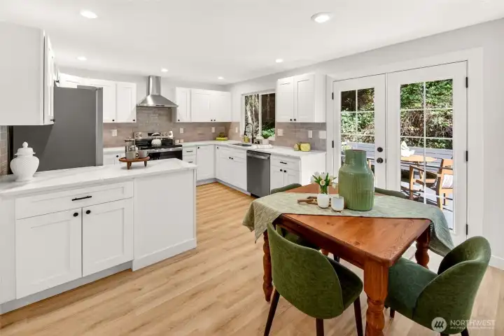 French doors to the entertainment style deck for indoor/outdoor living.