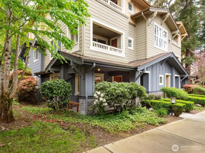 Welcoming exterior with lush landscaping and a peaceful, tucked-away feel.