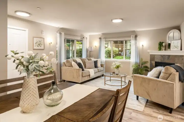 Spacious living room filled with natural light and warm, inviting tones.