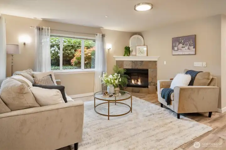 Cozy fireplace setting, the kind of space you’ll actually want to spend time in.