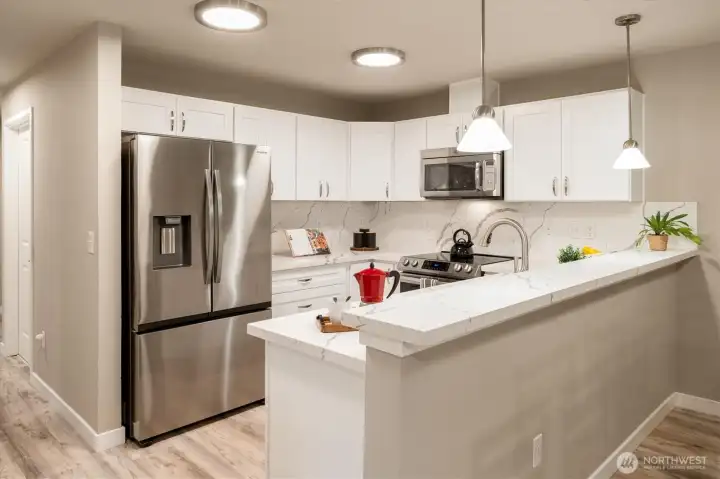 Clean, modern kitchen with updated finishes and plenty of room to cook and gather.