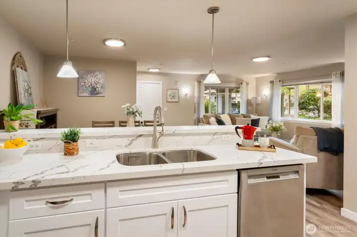 Bright and functional kitchen layout with ample storage and prep space.