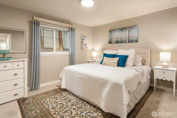 Primary suite with a calm, private feel and easy access to the bath.