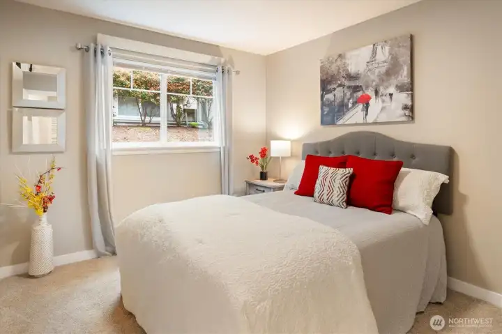 Bright and cozy bedroom with great natural light perfect for guests or everyday living.