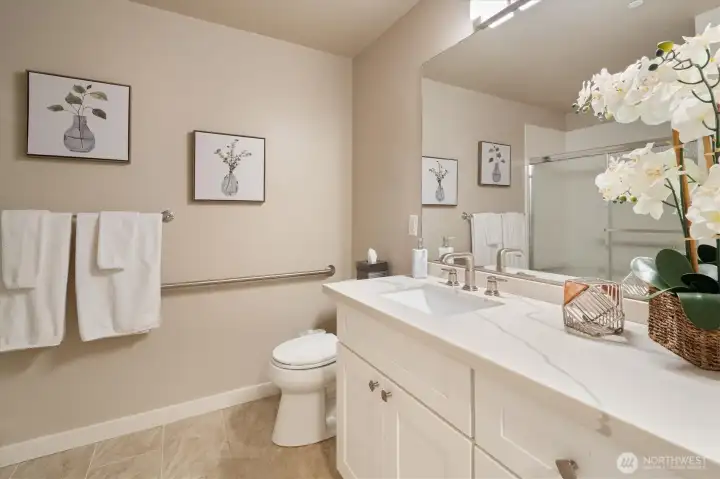 Clean, updated bathroom with a functional layout and ample counter space.