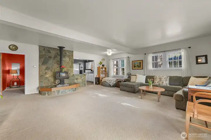 Very large livingroom with wood burning fireplace.