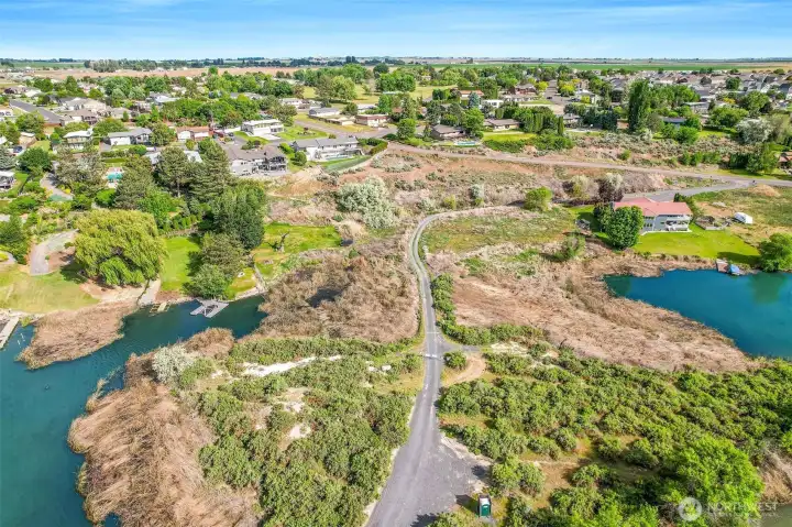 The property is in the curve of the gravel access road, and up the embankment up to Goodrich Rd. The property is in the curve of the gravel access road, and up the embankment up to Goodrich Rd.