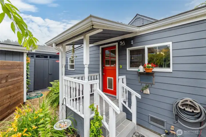 Back door leading to the gardens, storage area, apartment, office space and garage.