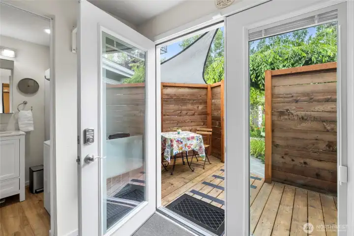 Entry off the garden with private deck.