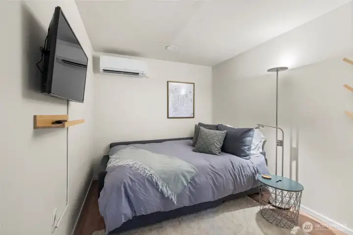 Bedroom doubles as living room. This bed converts to a couch.
