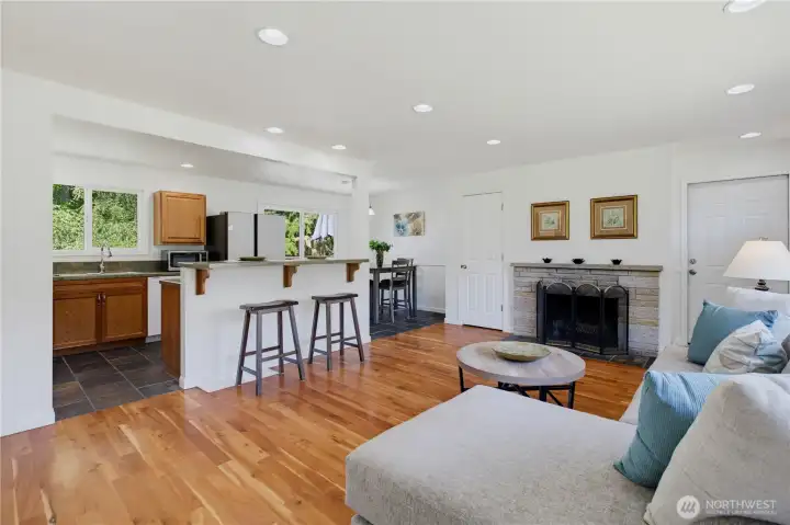 Living Room with Fireplace and Eating Bar Living Room with Fireplace and Eating Bar