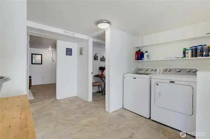 Laundry Room Adjacent to the Family Room and Access to the Studio Laundry Room Adjacent to the Family Room and Access to the Studio