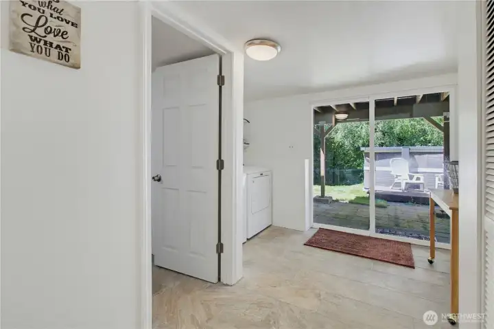 Basement Entrance with Access to Laundry and Studio Basement Entrance with Access to Laundry and Studio