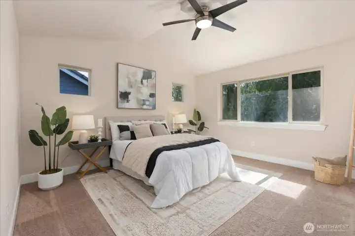 Primary suite with windows facing the greenbelt