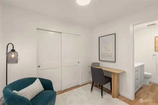 This cozy office nook offers the perfect setting for productivity or quiet reflection. With built-in storage and sleek modern decor, it’s ideal for remote work or an inspiring creative space.