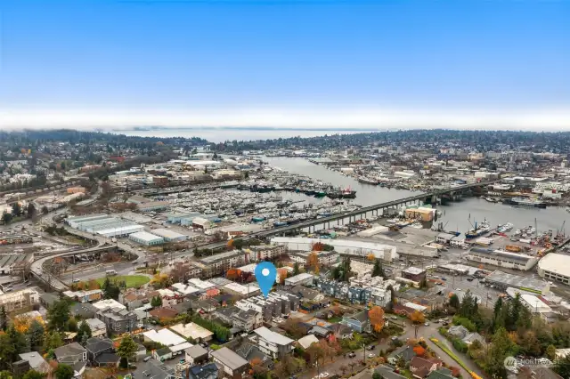 Nestled in the vibrant Queen Anne neighborhood, this aerial view highlights the serene, tree-lined streets and proximity to the water.