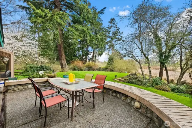 Patio off the kitchen with views of Mt. Rainier & the pond