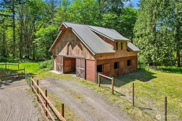 3 stall barn with wash stall, tack room, hay storage and huge loft.