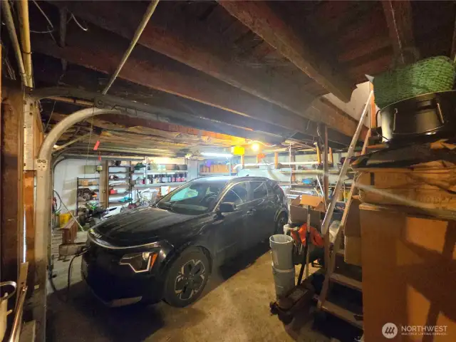 double car garage w/work space and under stair storage.  Huge pantry at top of stairs