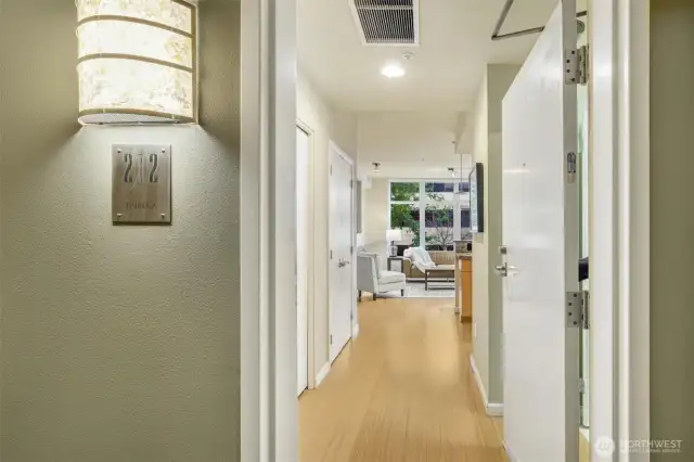 Gracious hallway lighting punctuates the zero stairs entry.
