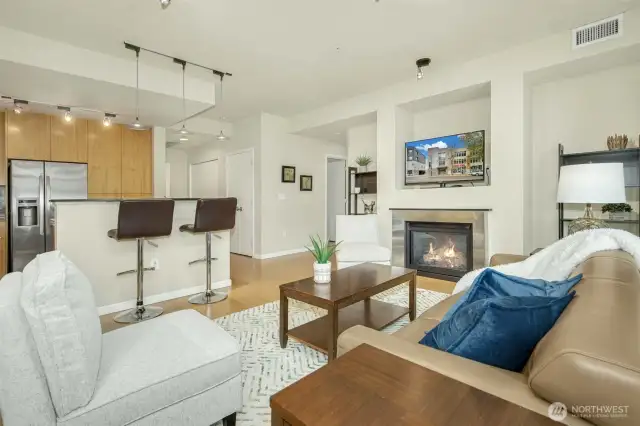 Open concept and bar countertop are perfect for conversation and convenience