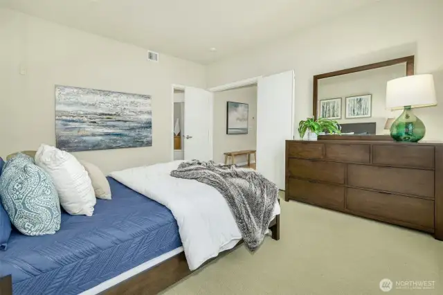 Primary bedroom with en suite bath and walk in closet