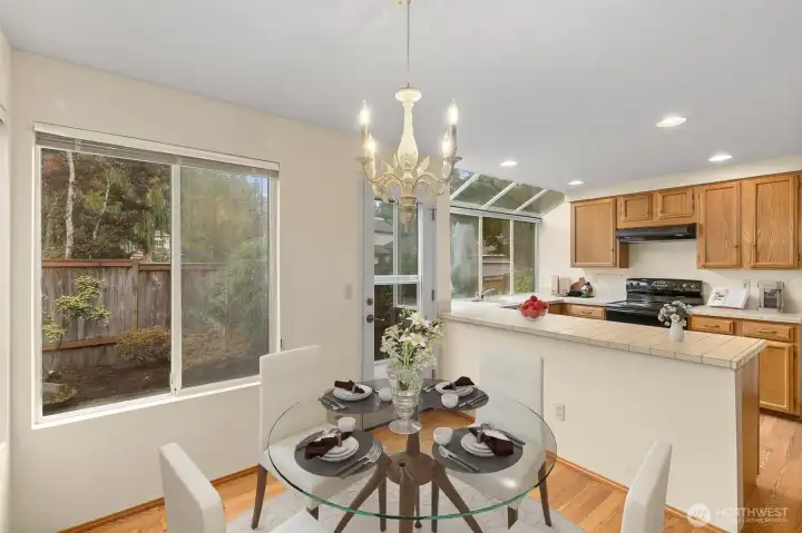 CASUAL DINING AREA W/ EASY ACCESS TO THE KITCHEN.