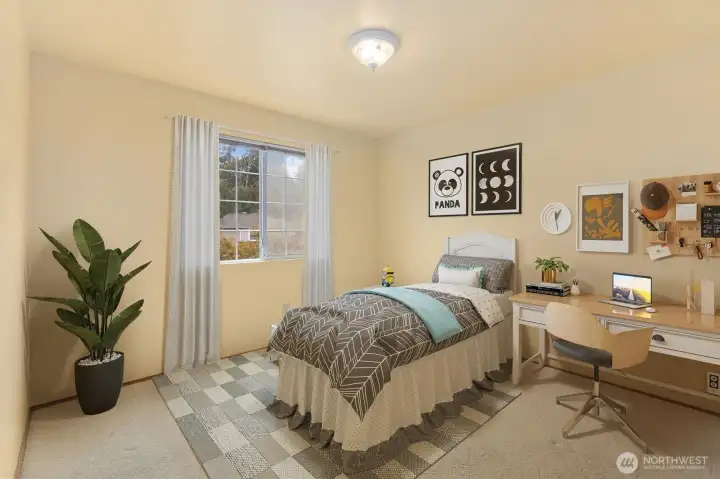 COMFORTABLE SECOND BEDROOM UPSTAIRS IS ATTRACTIVE AND BRIGHT.