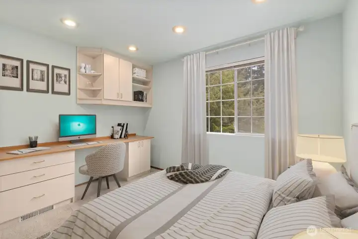 COZY THIRD BEDROOM UPSTAIRS IS ENJOYABLE AND QUIET, WITH BUILT IN DESK.