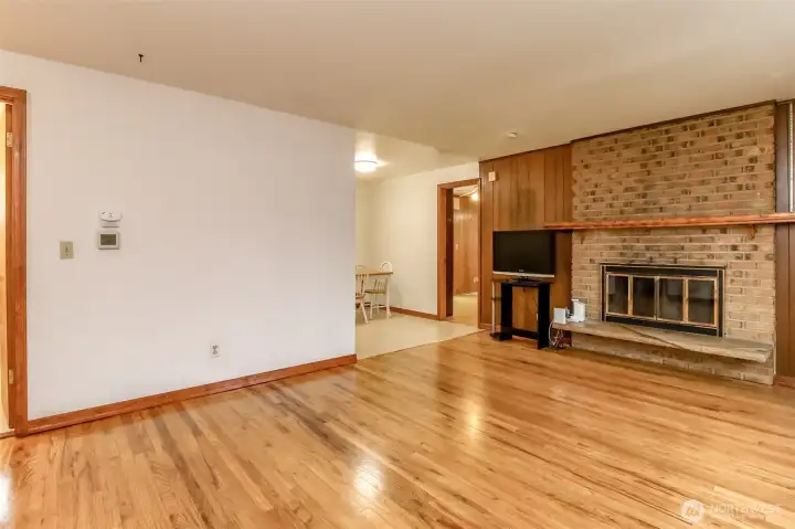Cozy living room with wood burning fireplace