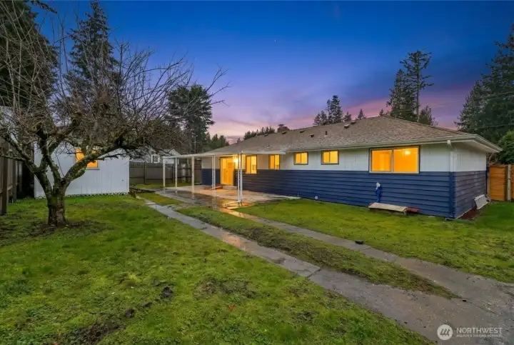 Full fenced backyard with gate access. *exterior enhanced*