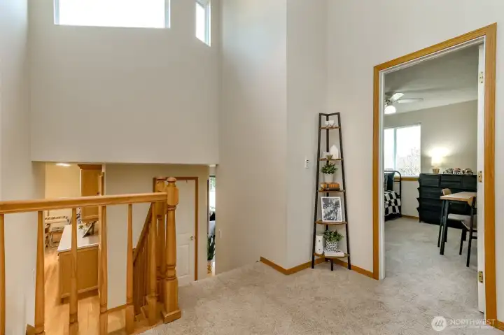 The second floor landing is light filled with the window and high ceilings.  There is newer carpet throughout the house.