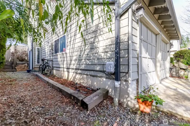 The large side yard could be fenced in if you wanted to store kayaks or other recreations equipment or create a side yard dog run.
