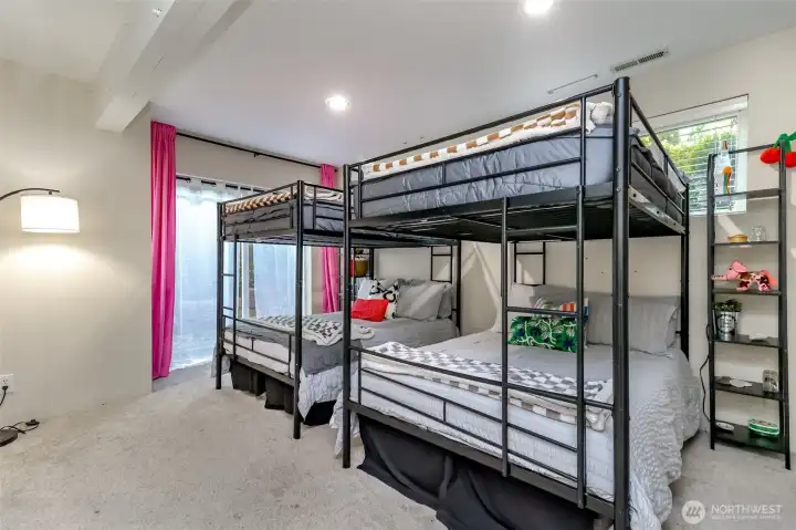 This ground level rec room is perfect for having an in home office as the door access from the outside makes it easy for guests/customers to get to.