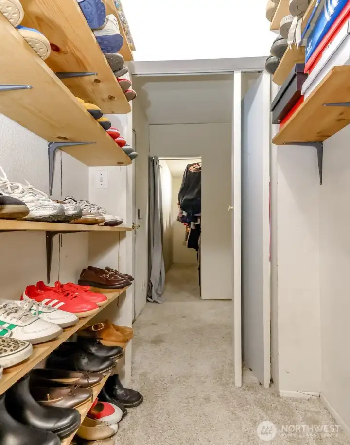 There are two walk in closets in the rec room which are both finished and have closet organizers.