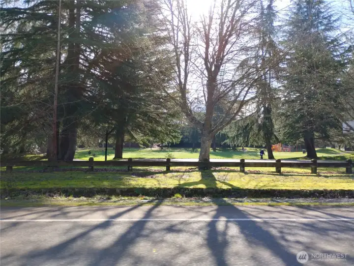 There is a public park off Dash Point Rd which has a large basketball court and towards the back there is children's play equipment.  There is public parking for access to this park.