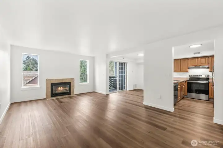 Welcome Home to Gleaming New LVP Floors, Cozy Gas Fireplace, New Interior Paint, All New Doors & Trim!