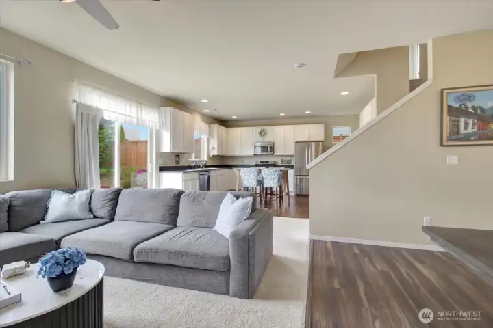 Living room is open to the dining room and kitchen.